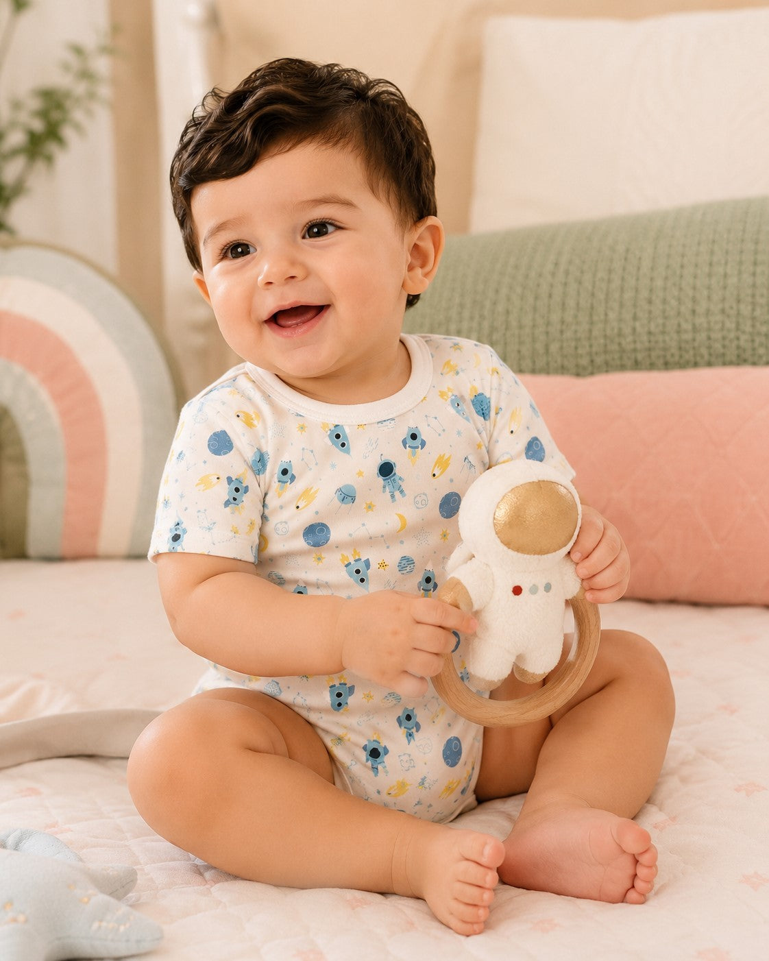 Baby wearing space explorer print romper from Miniwynk set of 3
